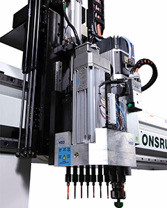 Close-up of a 9-Spindle Block Tech Spindle with drill, designed for rapid hole drilling in CNC machining.