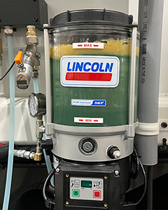 Automatic lubrication system in CNC machine by Lincoln, ensuring smooth operation and durability.