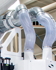 Dust stanchion kit coalescing multiple vacuum hoses into a single path for efficient dust extraction.