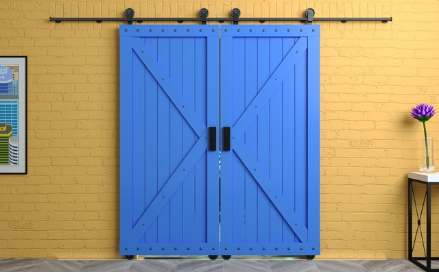 Barn-style blue sliding door with a rolling track system, demonstrating CNC machining applications in rolling door manufacturing.