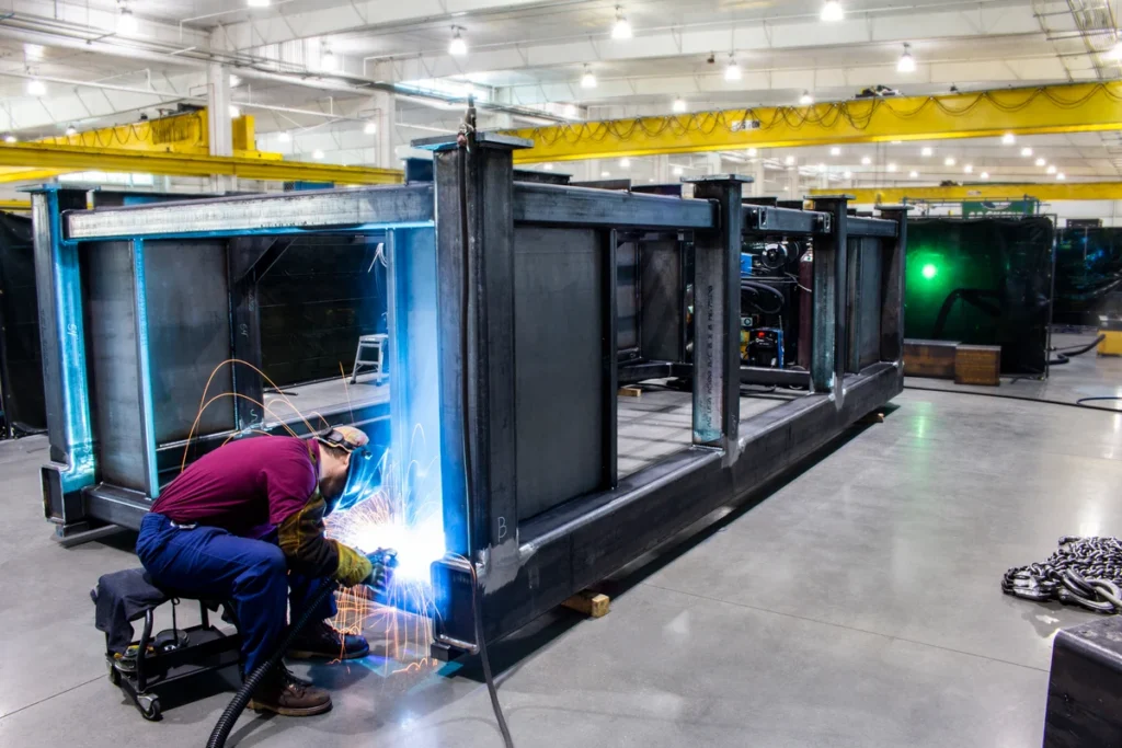 Welding the steel frame of the C.R. Onsrud Q-Series CNC machine at the Troutman, NC manufacturing facility.