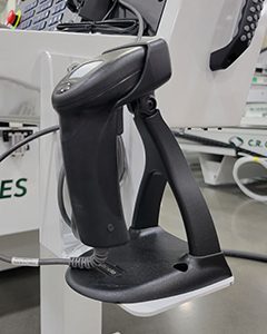 CNC Machine Barcode Scanner for Efficient Program Retrieval Close-up of a barcode scanner used on a CNC machine, allowing automatic retrieval of job-specific programs and setup instructions.