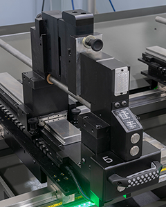 Manual clamps used on C.R. Onsrud X-Series and EX-Series CNC machines for securing aluminum extrusions during high-precision machining.